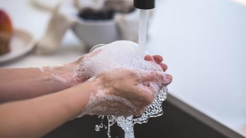 person-washing-hand